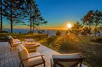 Oceanfront sunset view from the deck of a Shelter Cove vacation rental in Northern California’s Lost Coast.